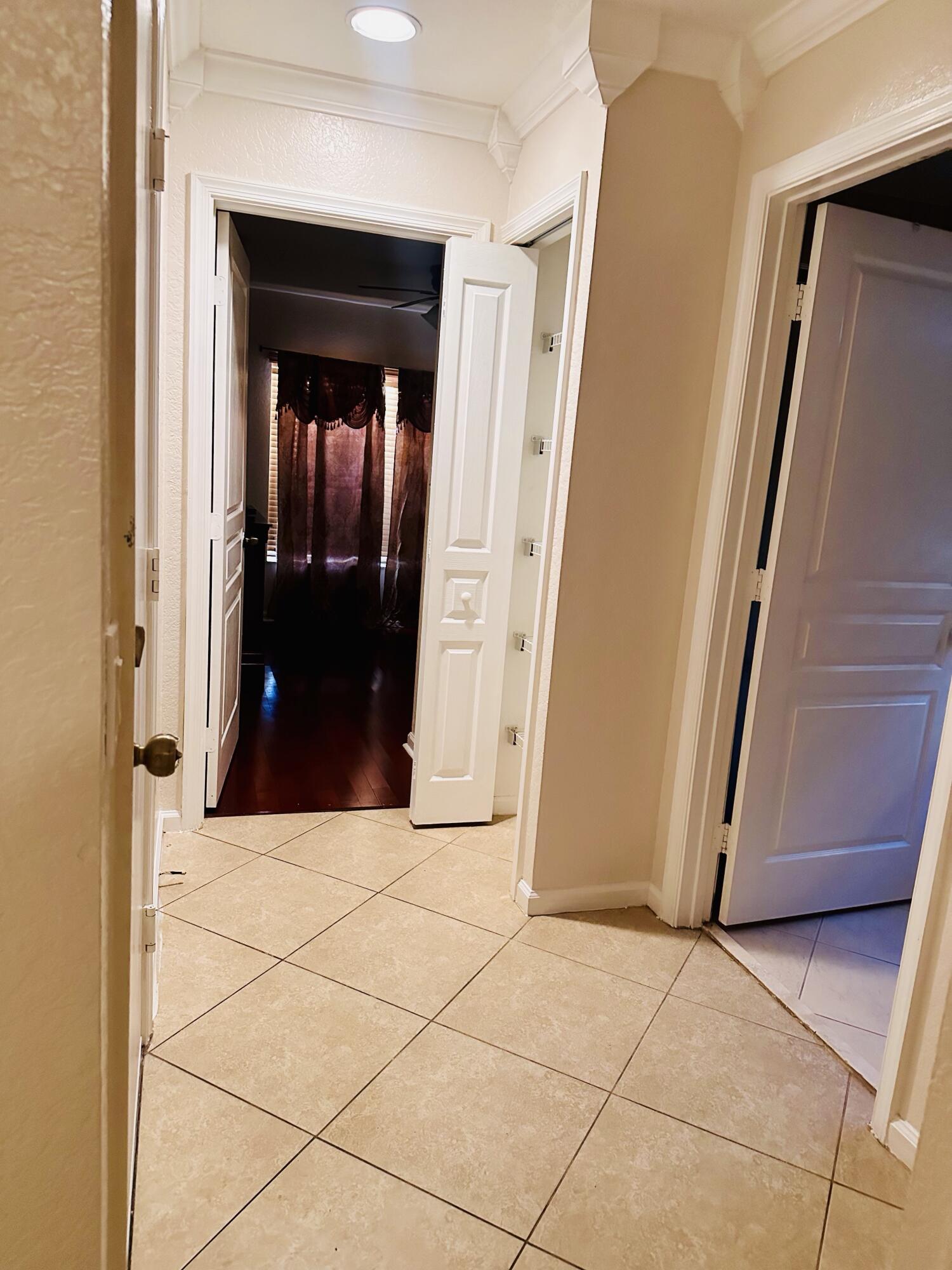 5200 Rising Comet Lane Greenacres, FL 33463 - Photo 25 of 50 a view of a entryway door of the house