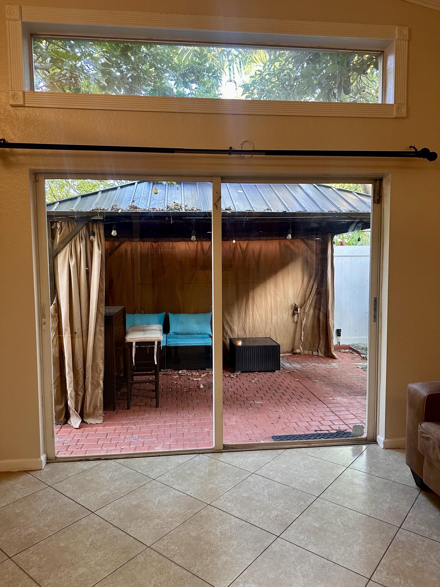 5200 Rising Comet Lane Greenacres, FL 33463 - Photo 33 of 50 a view of a room with a patio