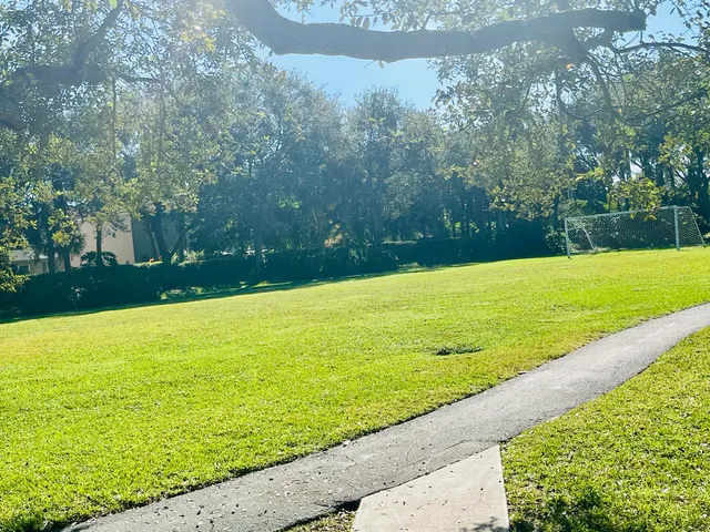 a view of a door and a window