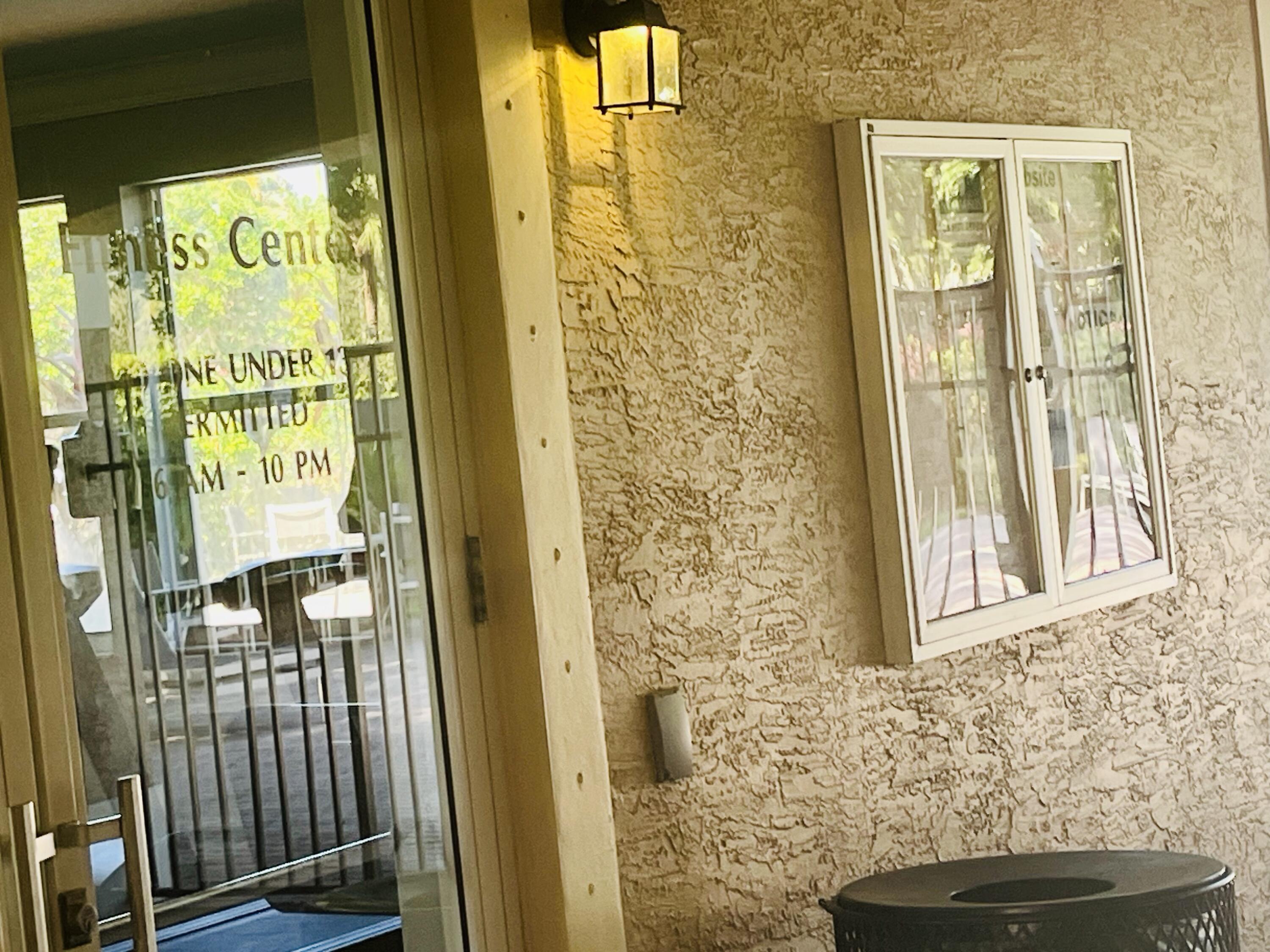 5200 Rising Comet Lane Greenacres, FL 33463 - Photo 49 of 50 a view of a door and a window