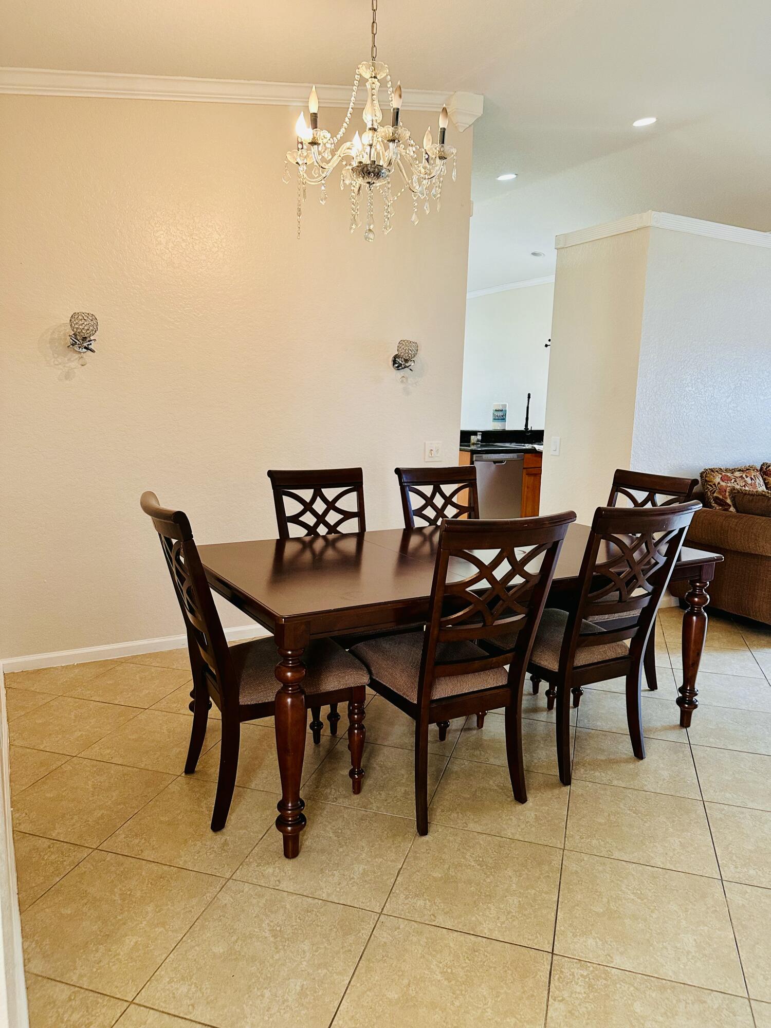 5200 Rising Comet Lane Greenacres, FL 33463 - Photo 8 of 50 a view of a dining room with furniture