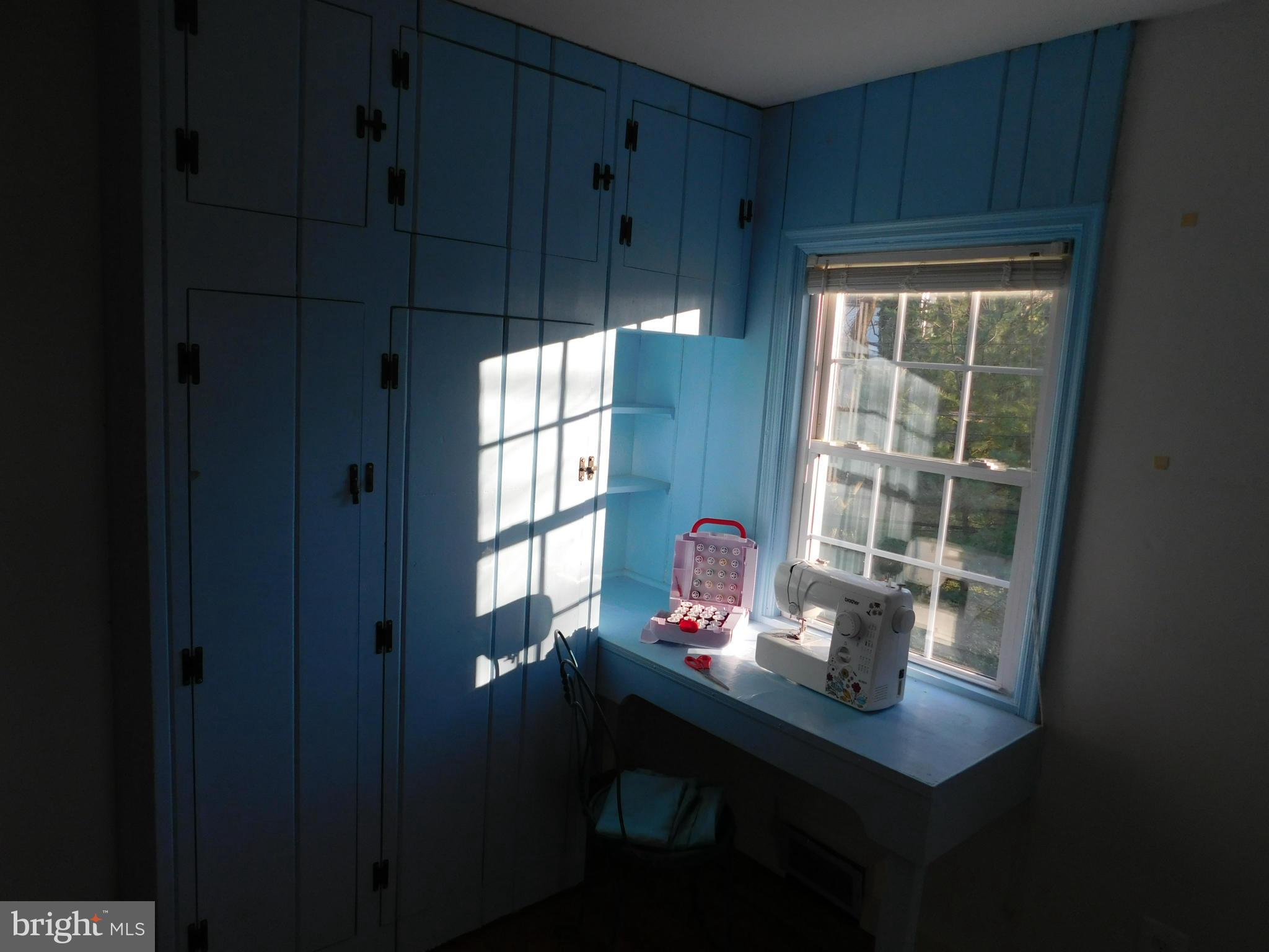 901 Adana Road Baltimore, MD 21208 - Photo 14 of 23 a view of a workspace with a window