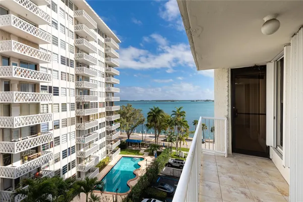 a view of a lake with building in front of it