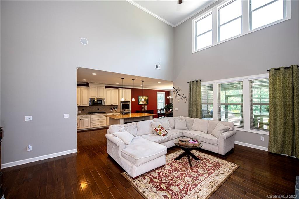 1452 Cilantro Court Tega Cay, SC 29708 - Photo 13 of 48 a living room with furniture and a large window