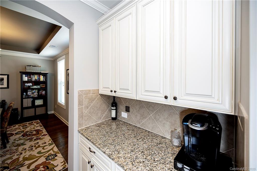 1452 Cilantro Court Tega Cay, SC 29708 - Photo 17 of 48 a view of hallway with washer and dryer