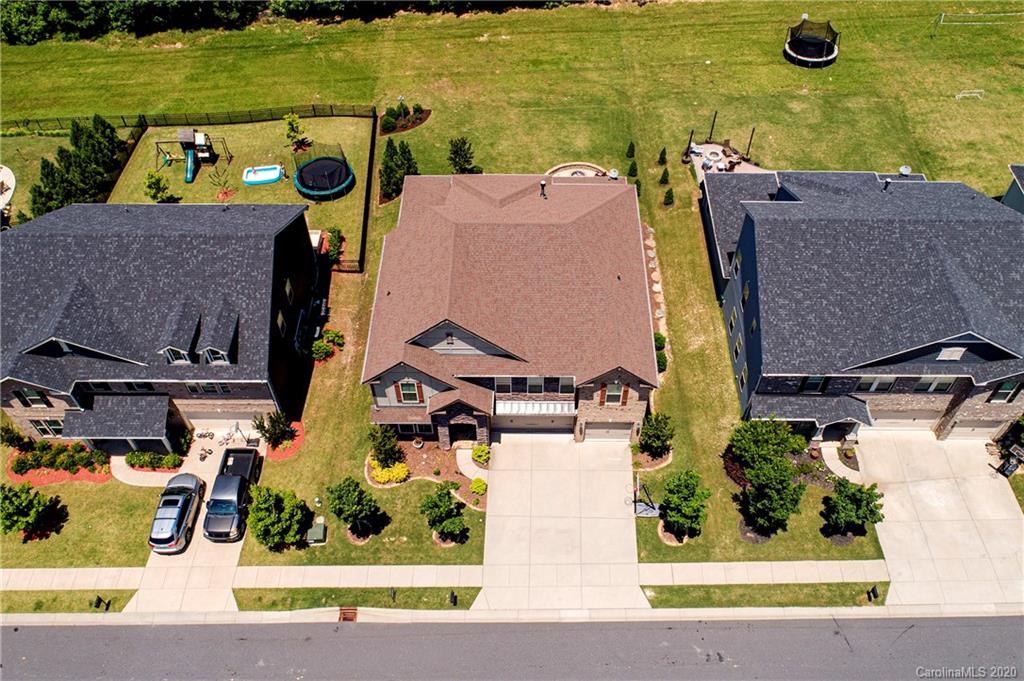 1452 Cilantro Court Tega Cay, SC 29708 - Photo 3 of 48 an aerial view of a house with a ocean view