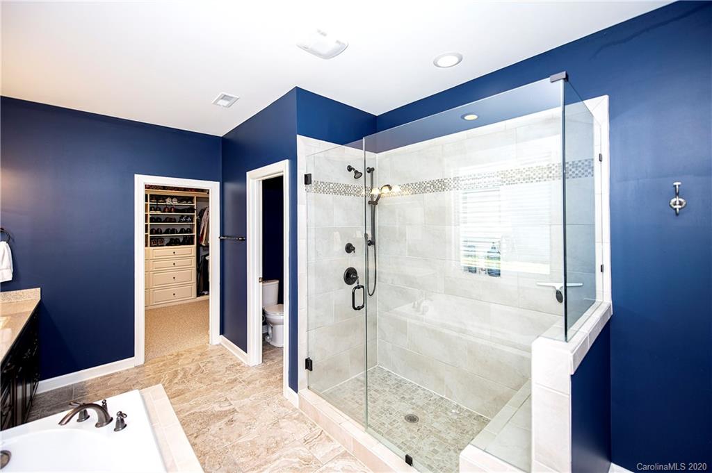 1452 Cilantro Court Tega Cay, SC 29708 - Photo 22 of 48 a bathroom with a shower and a sink