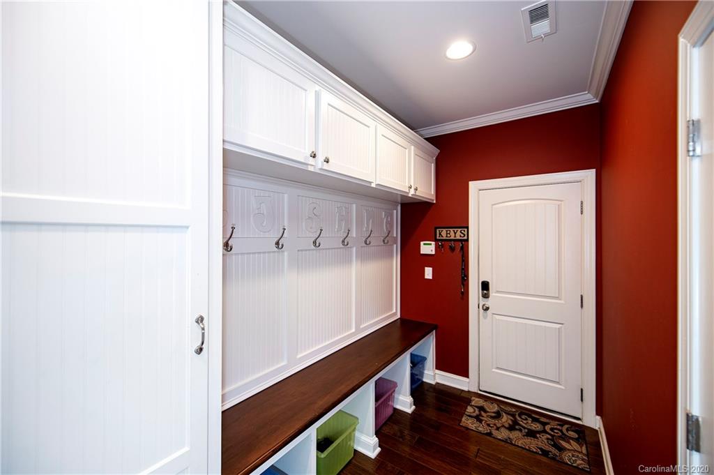 1452 Cilantro Court Tega Cay, SC 29708 - Photo 24 of 48 a view of an entryway with wooden floor