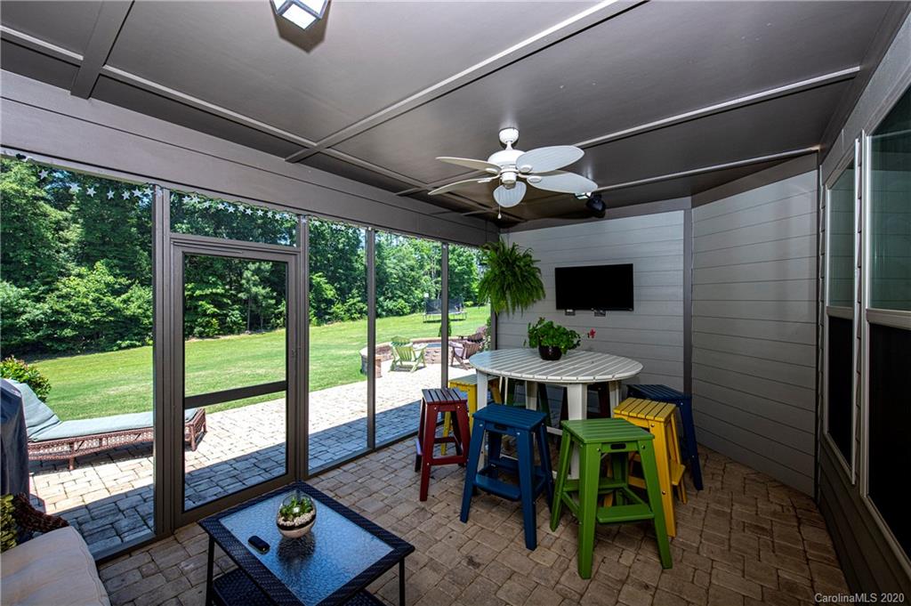 1452 Cilantro Court Tega Cay, SC 29708 - Photo 39 of 48 a view of a dining room with furniture window and outside view