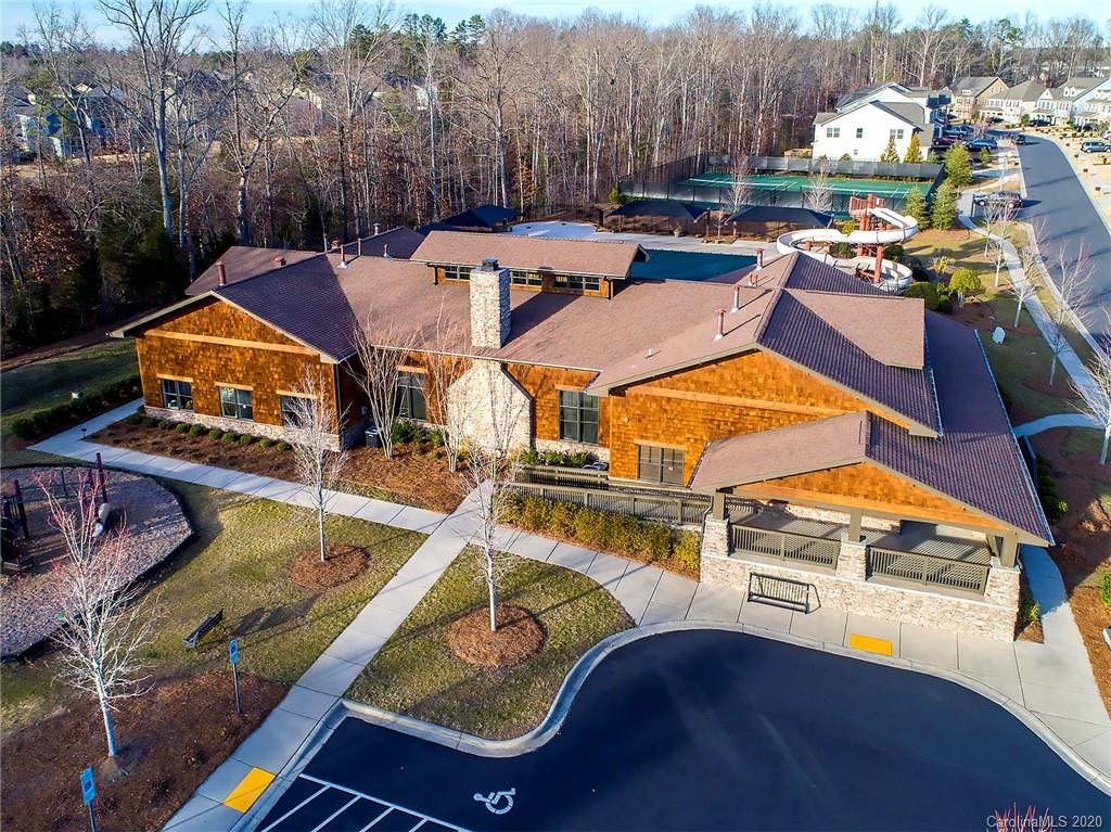 1452 Cilantro Court Tega Cay, SC 29708 - Photo 45 of 48 an aerial view of a house with swimming pool and ocean view