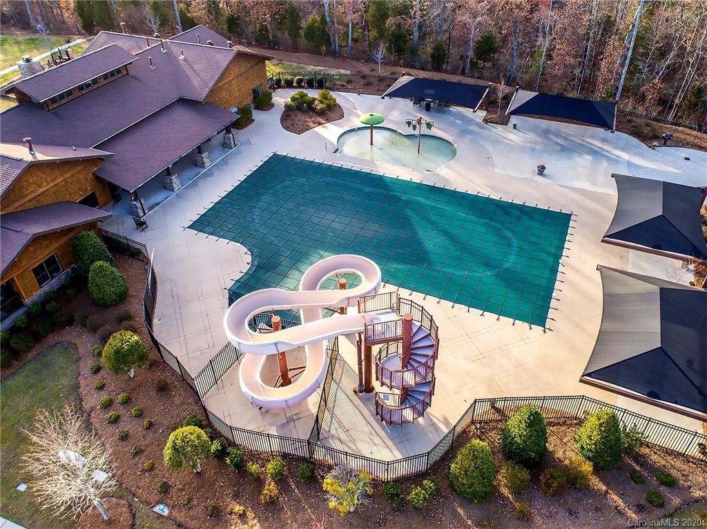 1452 Cilantro Court Tega Cay, SC 29708 - Photo 46 of 48 an aerial view of a swimming pool with outdoor seating