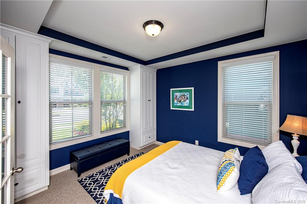 1452 Cilantro Court Tega Cay, SC 29708 - Photo 6 of 48 a bedroom with a bed and a window
