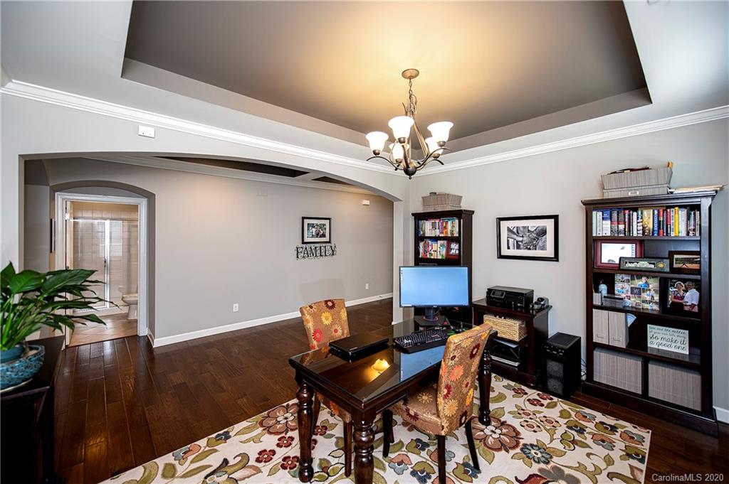 1452 Cilantro Court Tega Cay, SC 29708 - Photo 9 of 48 a view of a dining room with furniture