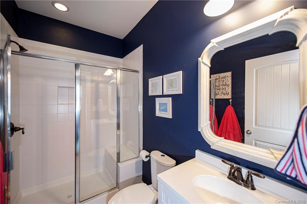 1452 Cilantro Court Tega Cay, SC 29708 - Photo 10 of 48 a bathroom with a sink toilet and shower