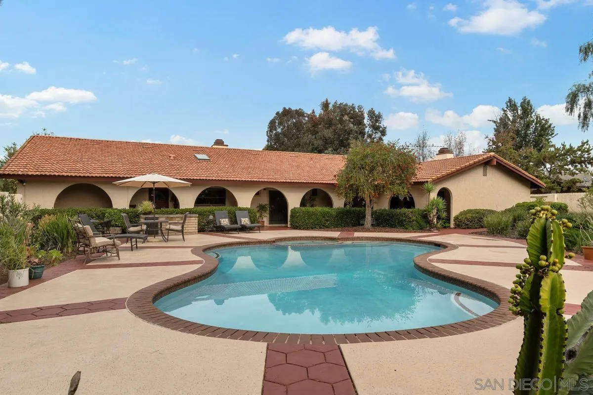13767 Proctor Valley Road Jamul, CA 91935 - Photo 1 of 50 a view of a house with swimming pool and sitting area