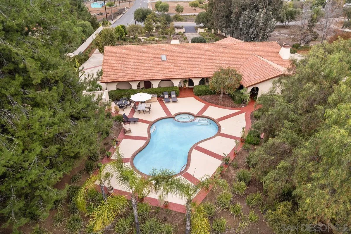 13767 Proctor Valley Road Jamul, CA 91935 - Photo 48 of 50 an aerial view of a house with swimming pool and outdoor space