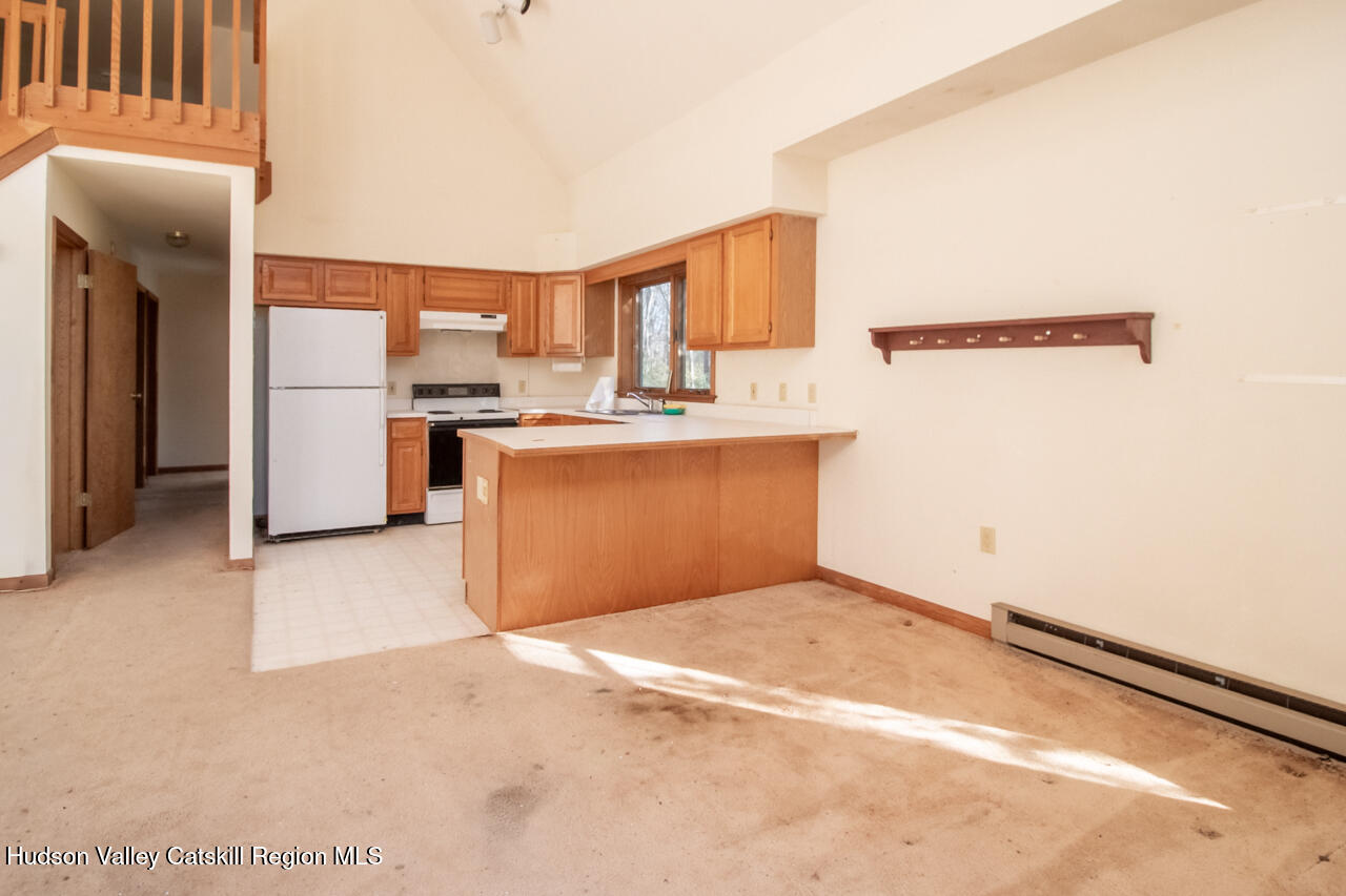 140 Stillerberg Strada Kerhonkson, NY 12446 - Photo 13 of 34 a view of a kitchen with a sink