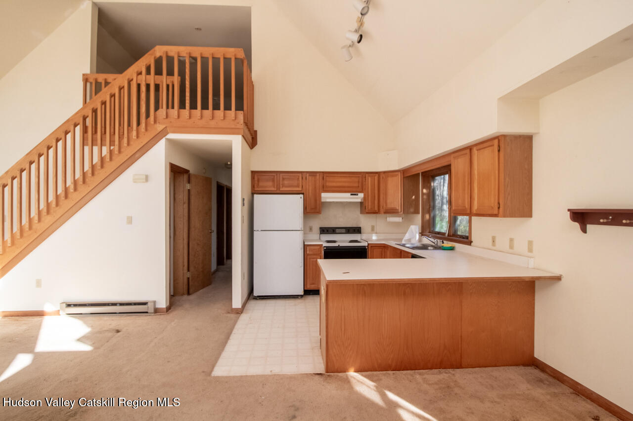 140 Stillerberg Strada Kerhonkson, NY 12446 - Photo 17 of 34 a view of a kitchen with a sink and dishwasher