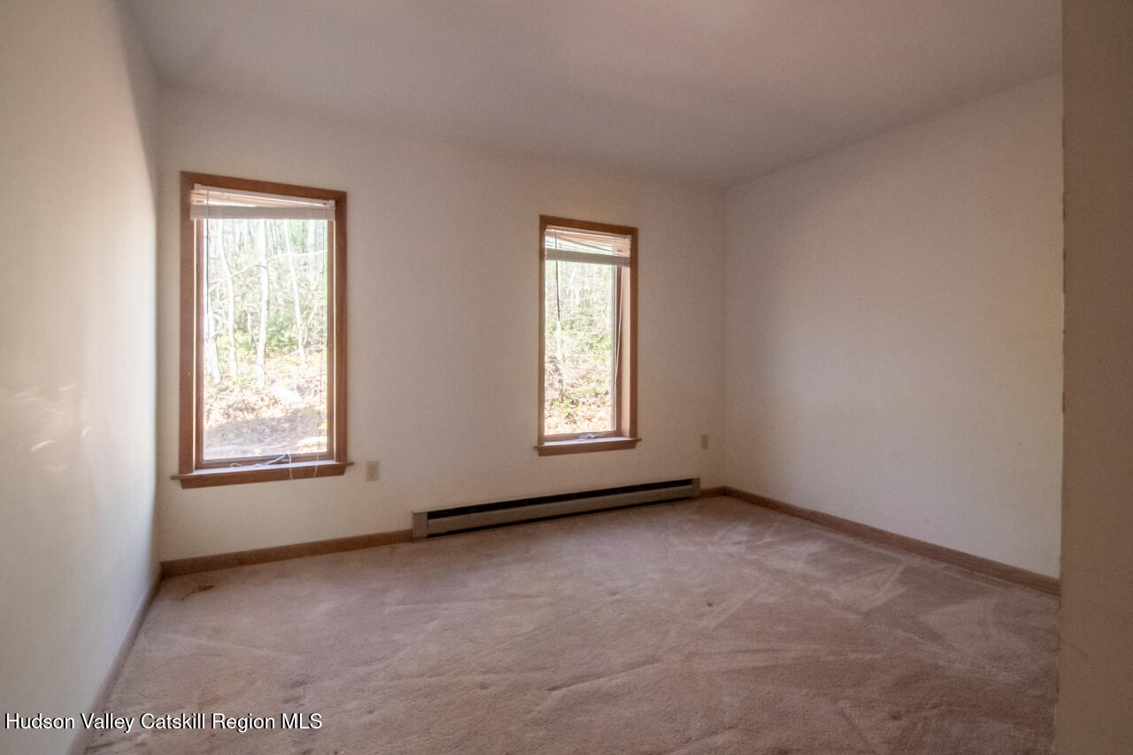 140 Stillerberg Strada Kerhonkson, NY 12446 - Photo 23 of 34 an empty room with windows