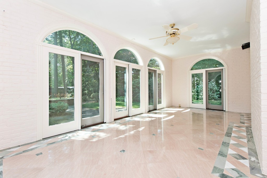 142 Neshobe Road Newton, MA 02468 - Photo 11 of 29 a view of an entryway with a garden