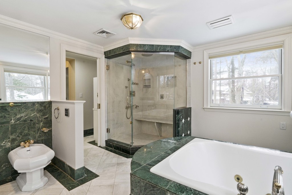 142 Neshobe Road Newton, MA 02468 - Photo 26 of 29 a bathroom with a sink a toilet and shower