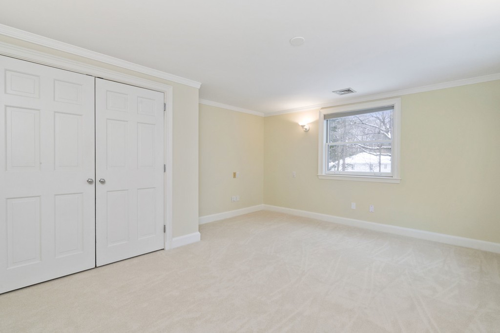 142 Neshobe Road Newton, MA 02468 - Photo 27 of 29 an empty room with windows