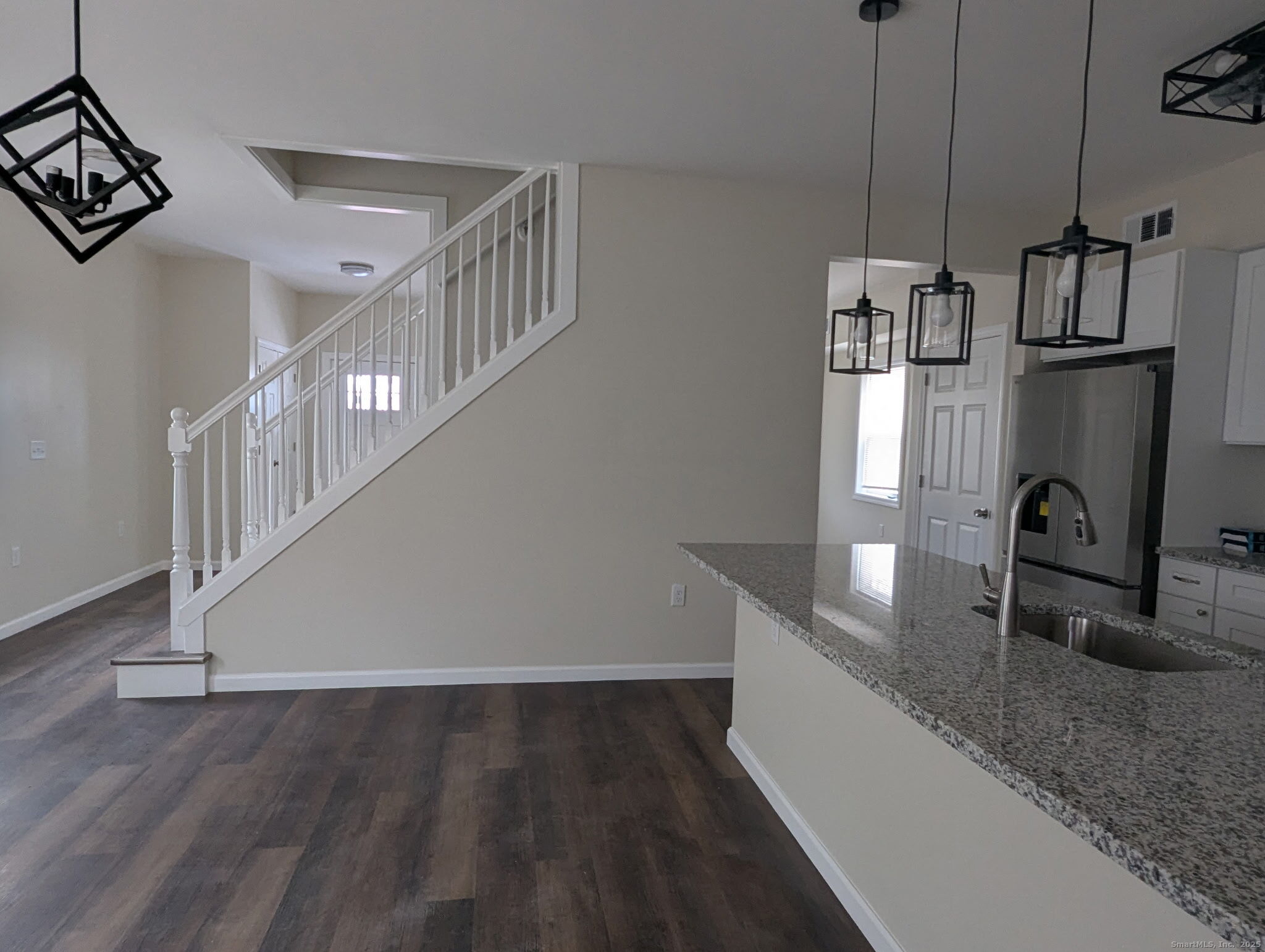 647 Broadview Terrace Hartford, CT 06106 - Photo 4 of 12 a view of a kitchen counter space with wooden floor