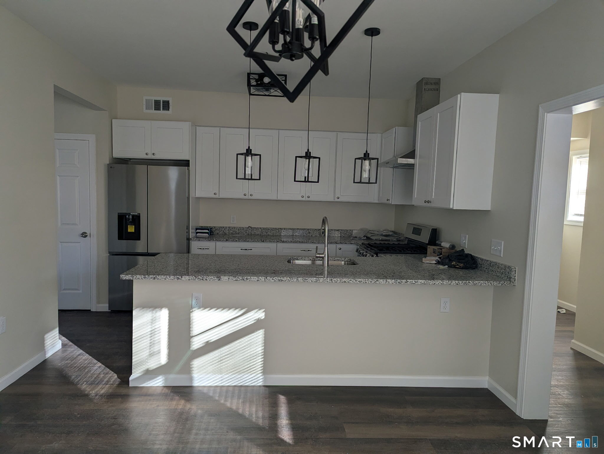 647 Broadview Terrace Hartford, CT 06106 - Photo 6 of 12 a kitchen with stainless steel appliances granite countertop a sink a stove and a refrigerator