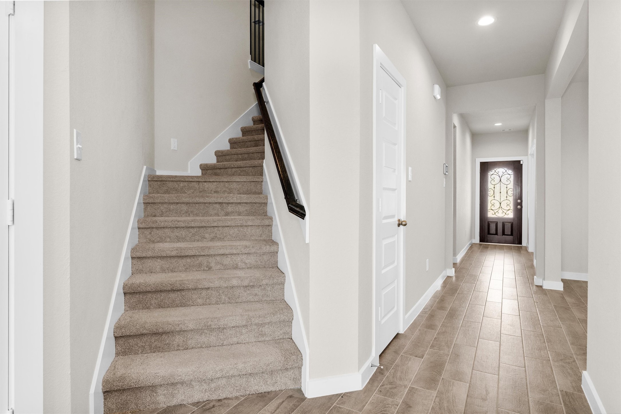 2210 Reed Cave Ln Spring Spring, TX 77386 - Photo 27 of 39 Stairway to the game room and three additional bedrooms.