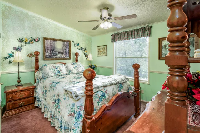 a bed room with furniture and a chandelier