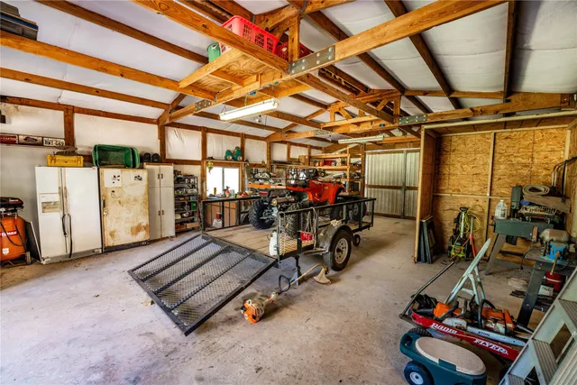 a view of a house with backyard porch and sitting area
