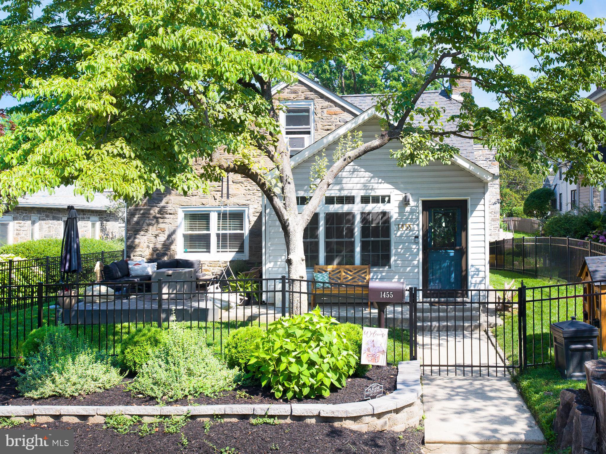 1455 Manoa Road Wynnewood, PA 19096 - Photo 1 of 27 a front view of a house with porch
