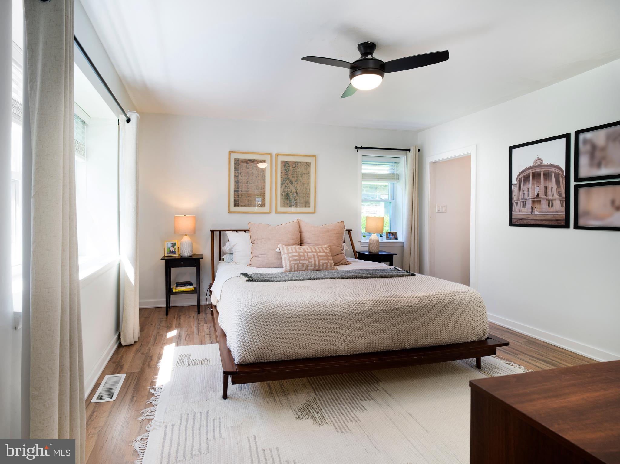 1455 Manoa Road Wynnewood, PA 19096 - Photo 14 of 27 a bedroom with a bed and wooden floor