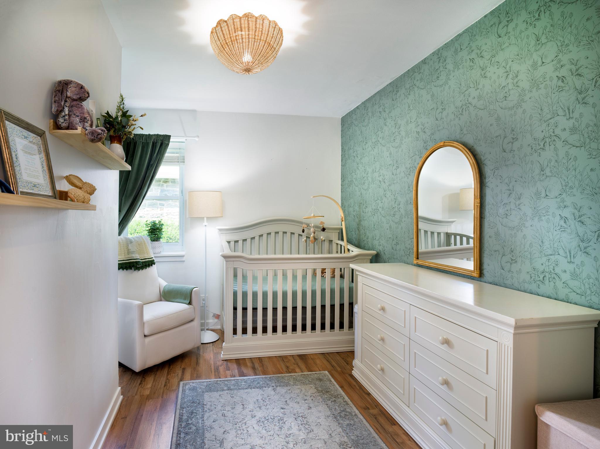 1455 Manoa Road Wynnewood, PA 19096 - Photo 16 of 27 a bedroom with a bed and a window