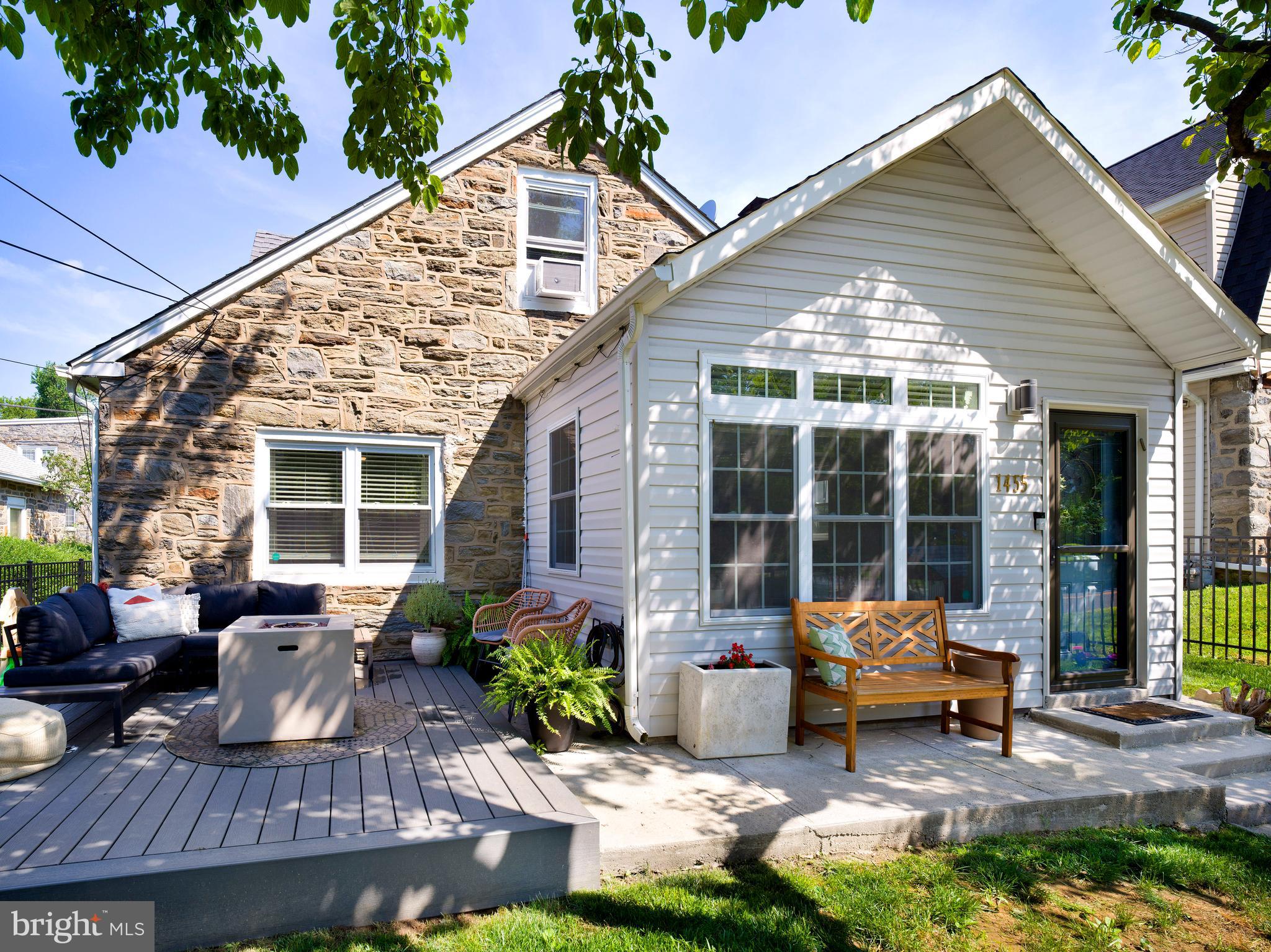 1455 Manoa Road Wynnewood, PA 19096 - Photo 2 of 27 a backyard of a house with seating space