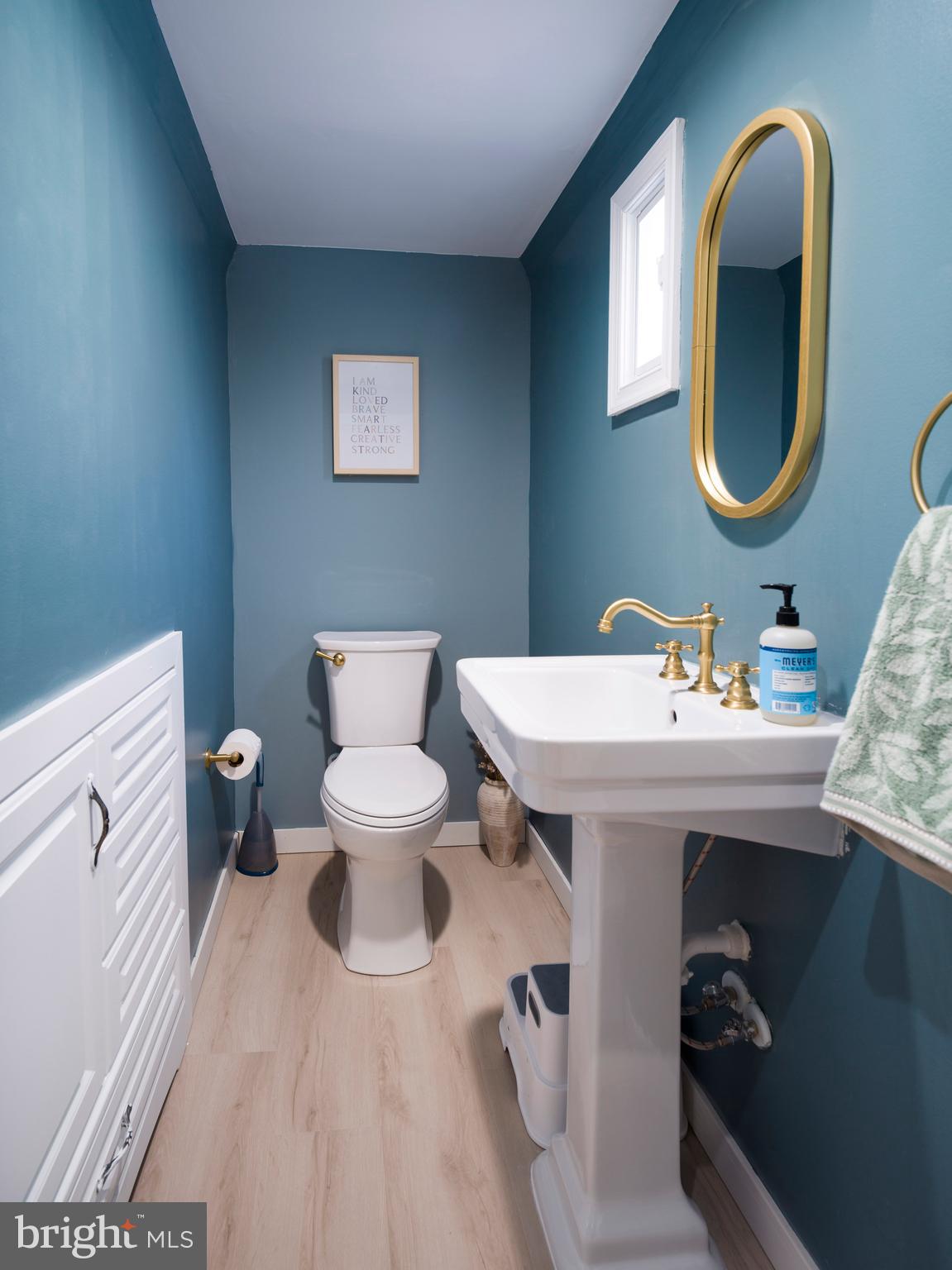 1455 Manoa Road Wynnewood, PA 19096 - Photo 22 of 27 a bathroom with a toilet sink and mirror