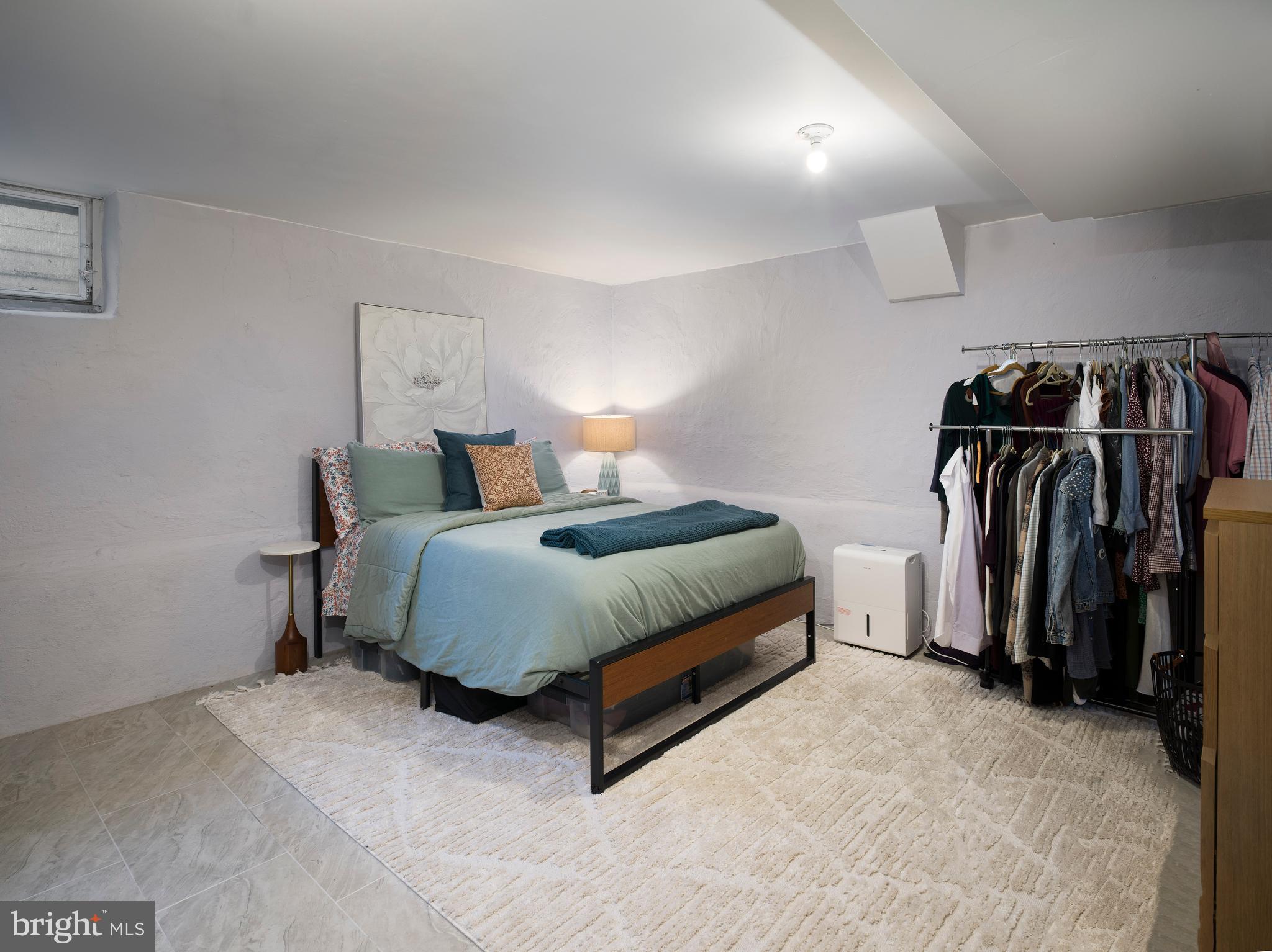 1455 Manoa Road Wynnewood, PA 19096 - Photo 26 of 27 a spacious bedroom with a bed and a walk in closet