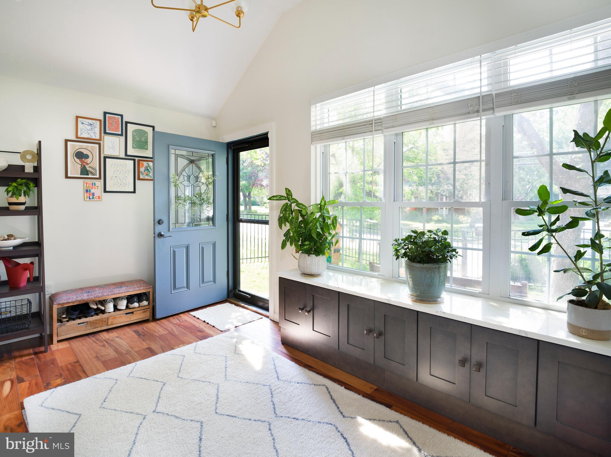 1455 Manoa Road Wynnewood, PA 19096 - Photo 3 of 27 a spacious bathroom with stainless steel appliances a large window and a potted plant