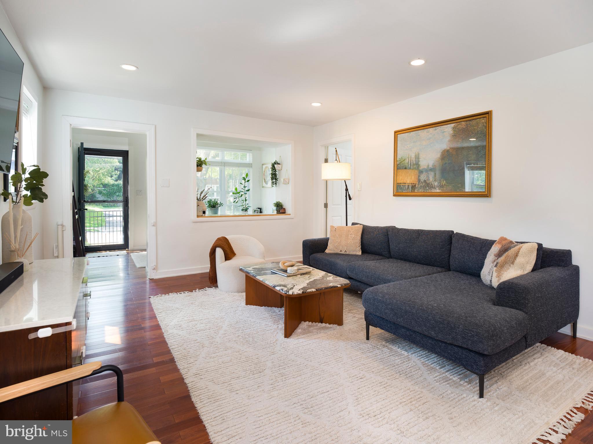1455 Manoa Road Wynnewood, PA 19096 - Photo 6 of 27 a living room with furniture and a window