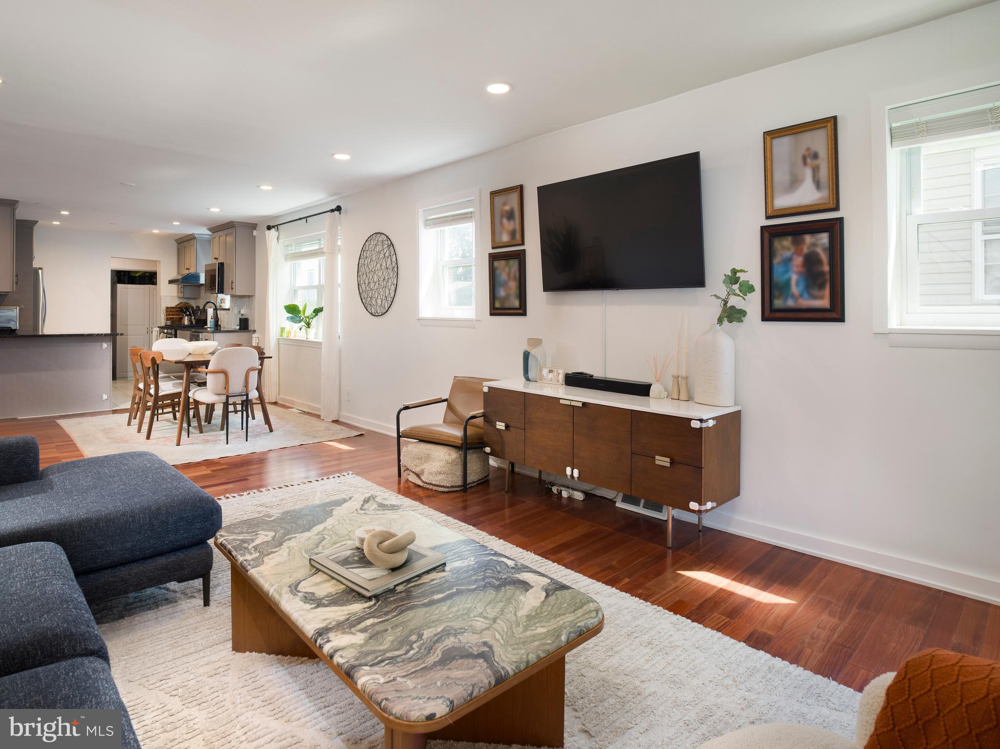 1455 Manoa Road Wynnewood, PA 19096 - Photo 7 of 27 a living room with furniture and a flat screen tv