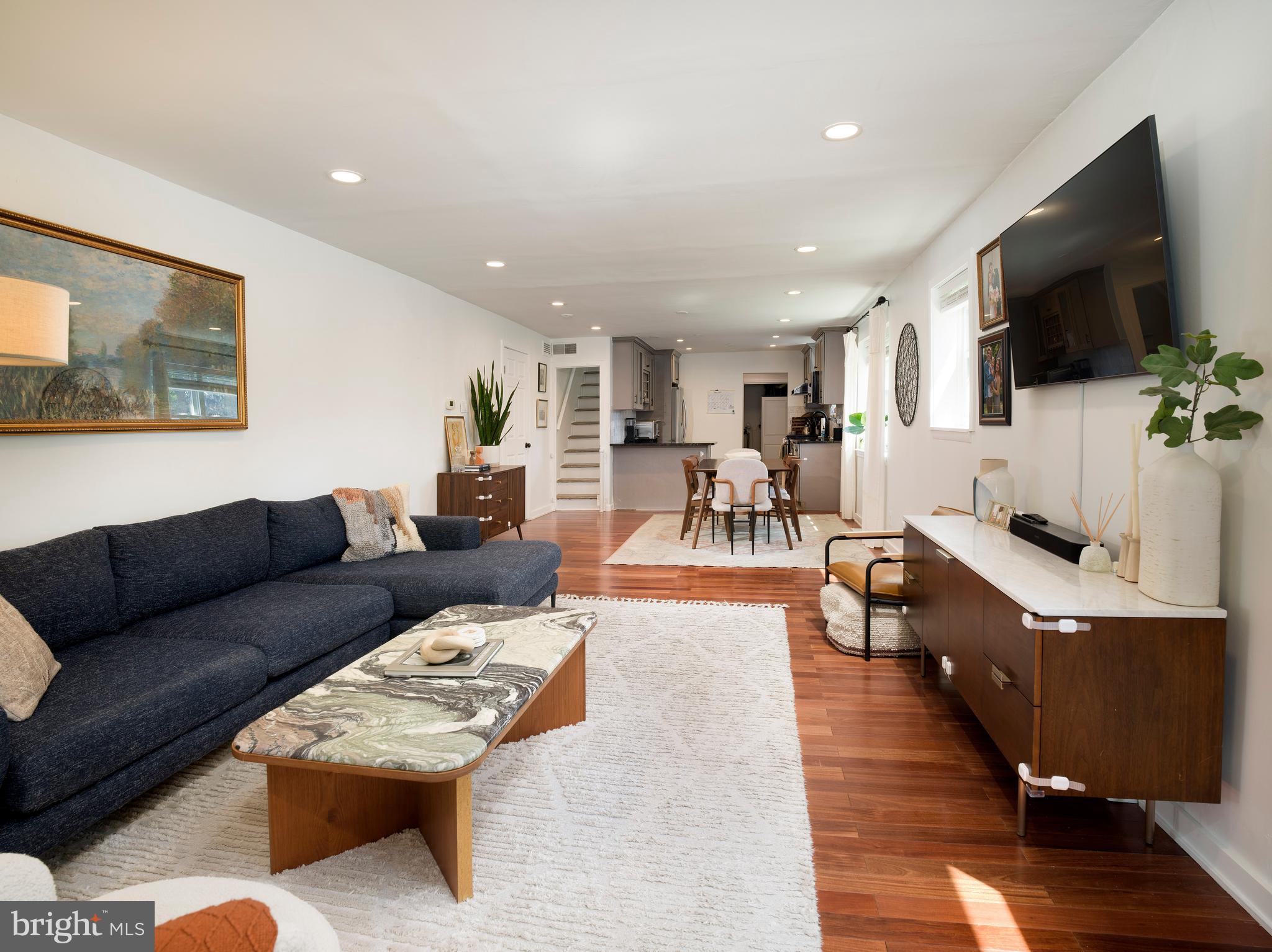 1455 Manoa Road Wynnewood, PA 19096 - Photo 9 of 27 a living room with furniture and a flat screen tv