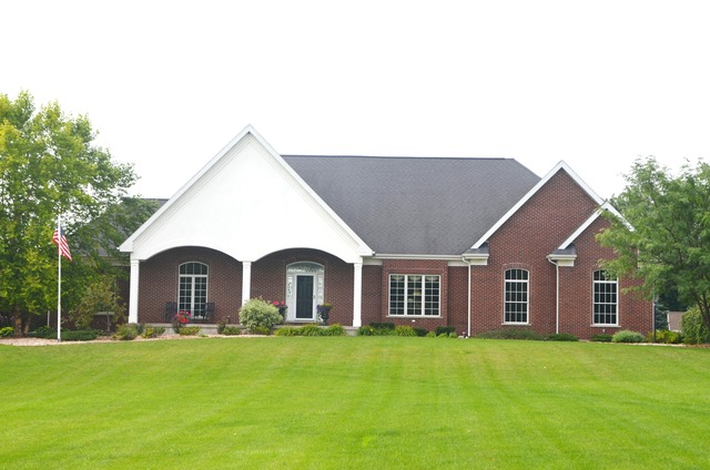 6 North 42nd Road Mendota, IL 61342 - Photo 1 of 25 a view of a house with a backyard