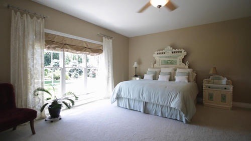 6 North 42nd Road Mendota, IL 61342 - Photo 12 of 25 a bedroom with a bed and a large window