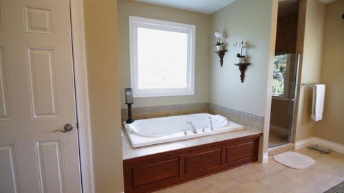 6 North 42nd Road Mendota, IL 61342 - Photo 14 of 25 a bathroom with a tub sink and mirror