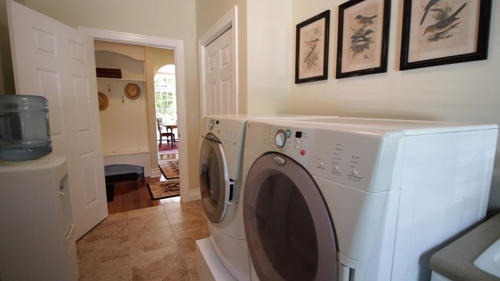 6 North 42nd Road Mendota, IL 61342 - Photo 18 of 25 a view of a hallway with washer and dryer