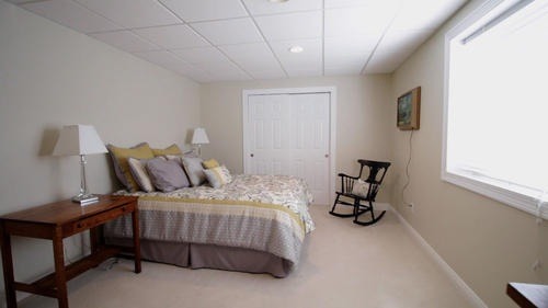 6 North 42nd Road Mendota, IL 61342 - Photo 21 of 25 a bedroom that has a bed and a chair in it