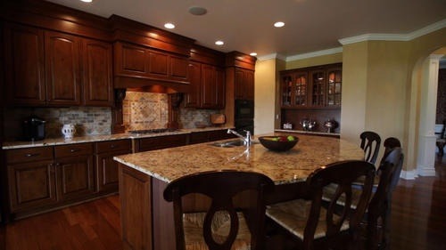 6 North 42nd Road Mendota, IL 61342 - Photo 6 of 25 a kitchen with stainless steel appliances granite countertop a table chairs and a refrigerator