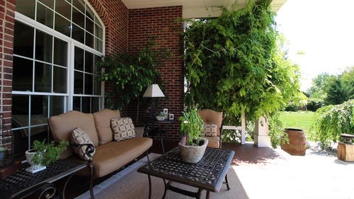 6 North 42nd Road Mendota, IL 61342 - Photo 9 of 25 a view of a patio with couches and potted plants