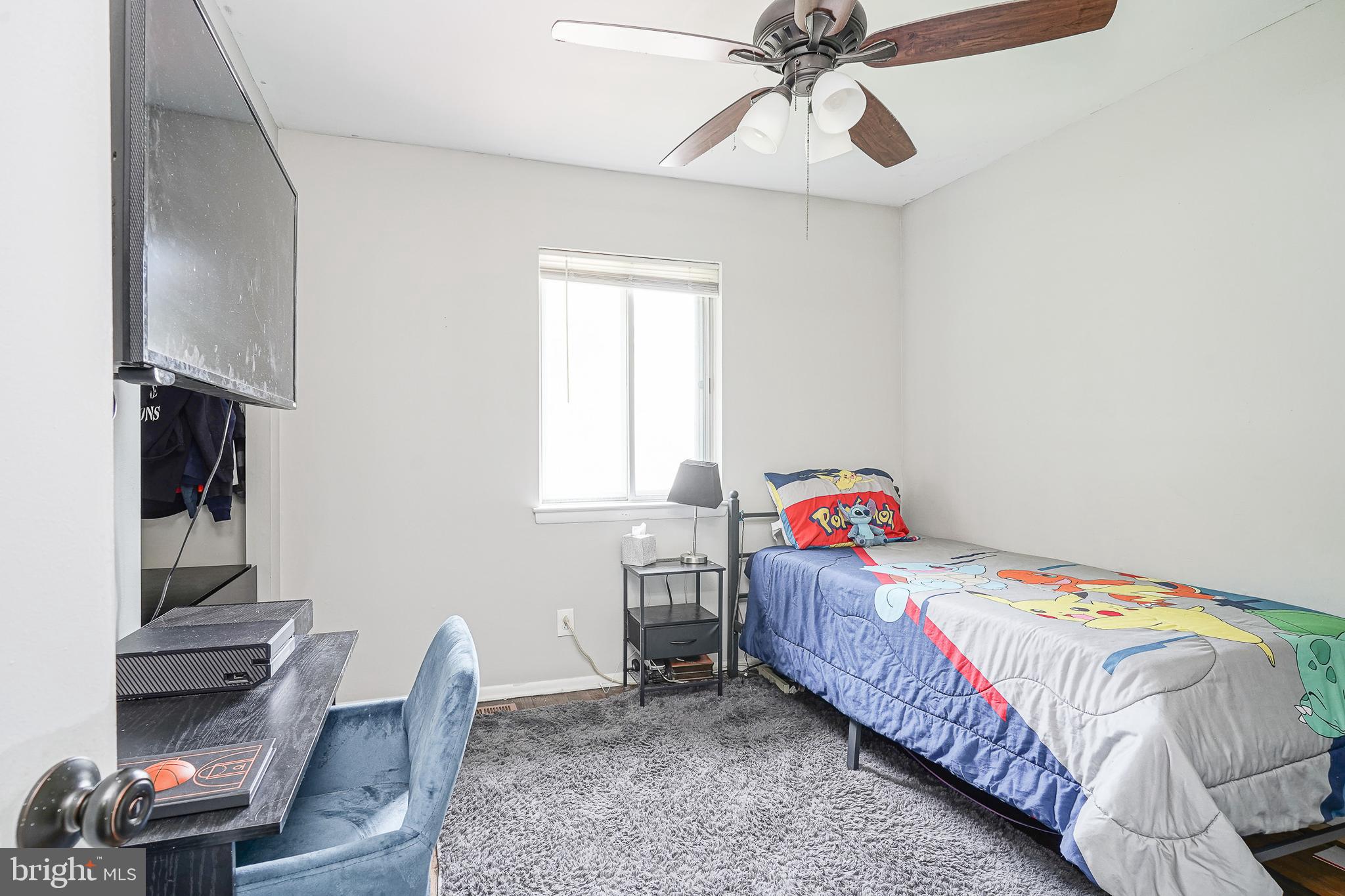 47 Bryant Road Blackwood, NJ 08012 - Photo 11 of 21 a bedroom with a bed and wooden floor
