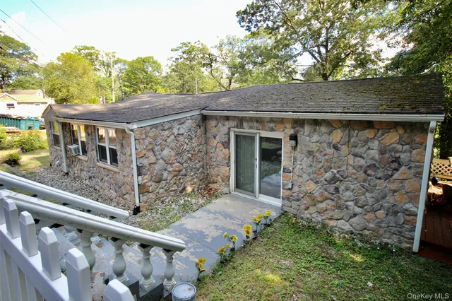 a backyard of a house with lots of green space